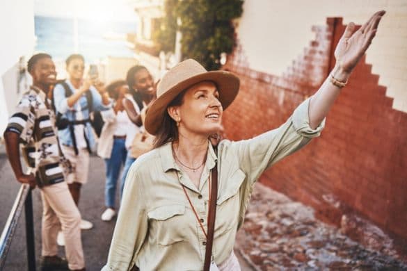 A field trip teacher guiding students on a tour